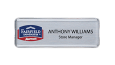 Reusable name badge holder and insert